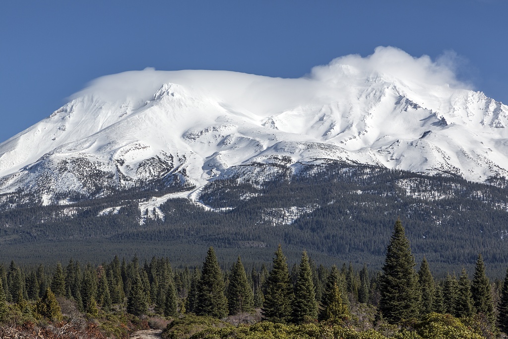 Distant views of looming Mount Shasta