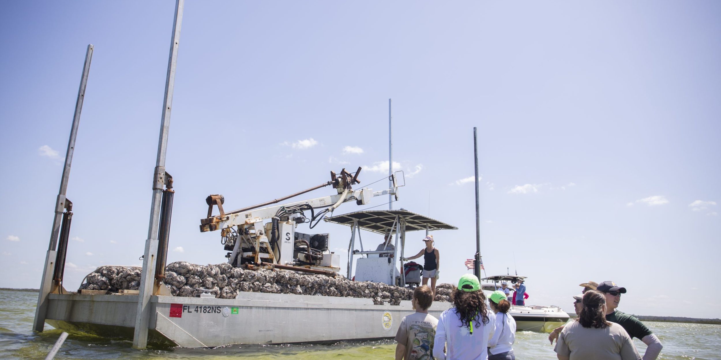 Local volunteers in Hernando County, Florida prepare to install oyster reefs on April 14, 2018, to strengthen shorelines, support healthy fisheries and improve water quality.